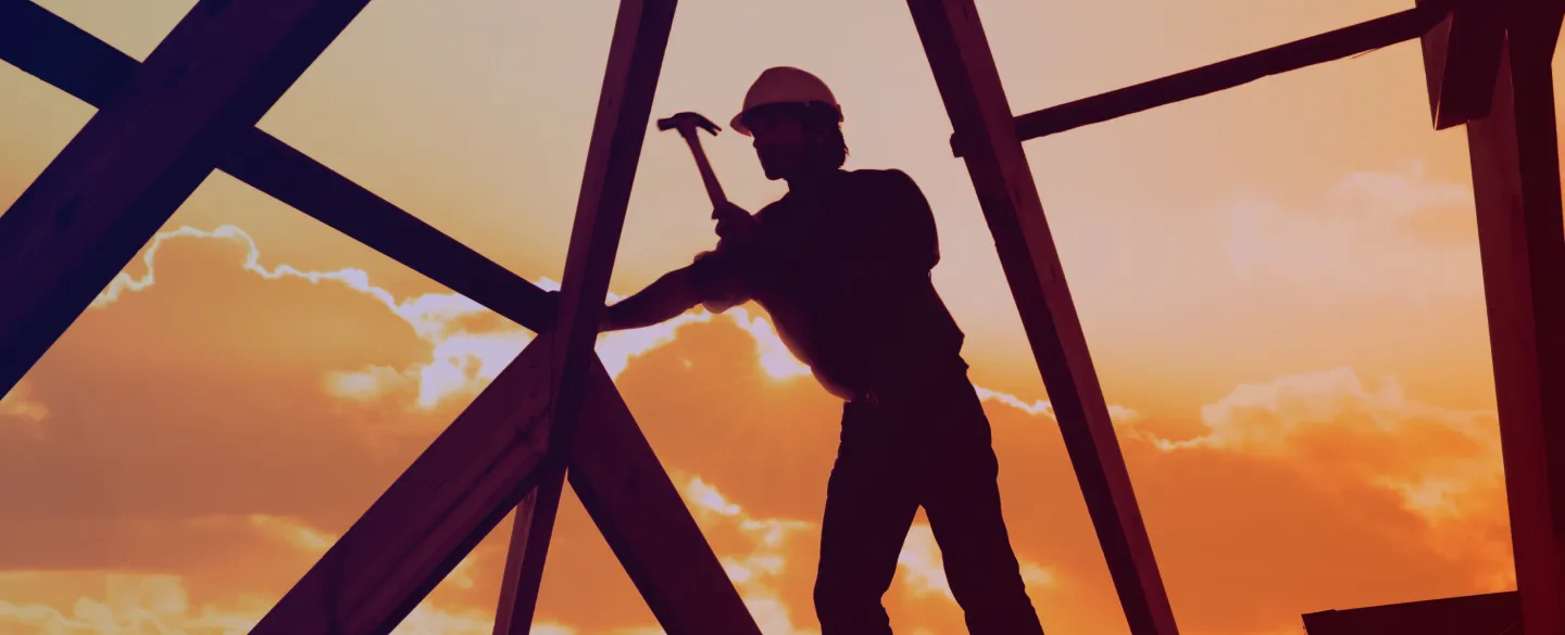 man with hammer new roof construction osage beach mo