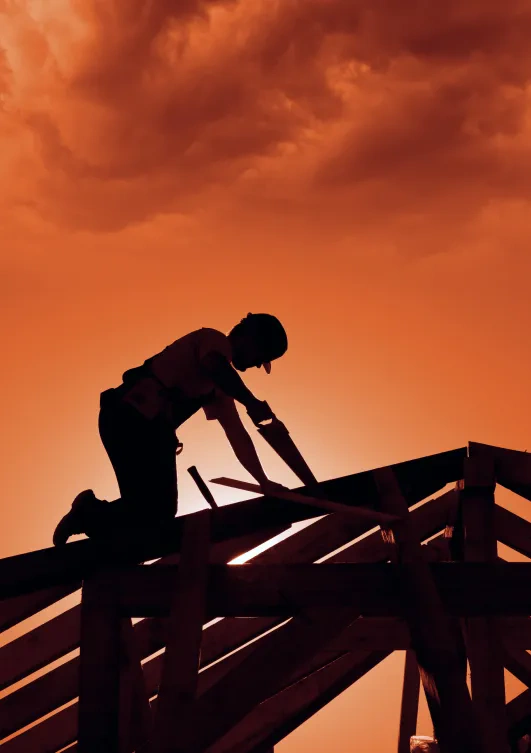 man with saw roof construction osage beach mo